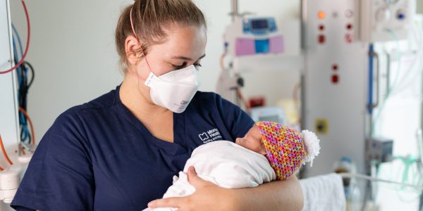 Pictured: Felicity Elena Henry (baby) and Ruby Aitken, Registered Nurse. At Monash Children’s Hospital. Copyright Monash Health. Not for use without prior written permission.