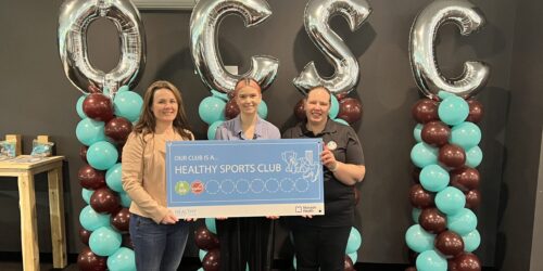 Photograph of Healthy Sports Club sign presentation