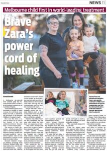 A page of a newspaper featuring a photo of a 6-year-old girl with her family. The headline reads 'Melbourne child first in world-leading treatment'.
