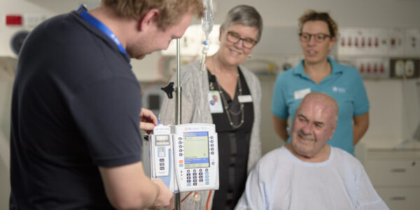 Pictured: Project Manager John Mansfield Director of Pharmacy Sue KirsaAccount Manager Clare Pratt  Patient Gilbert John ChristieSmart Pumps Go-Live at Monash Medical Centre. Copyright Monash Health. Not for use without prior written permission.